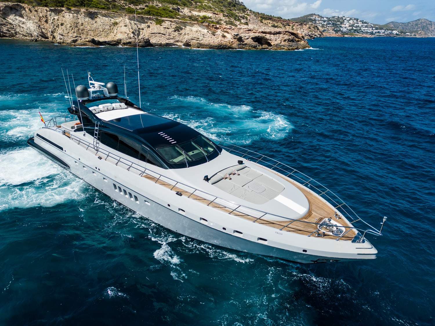 Yacht crossing from Ibiza to Mallorca at sunrise