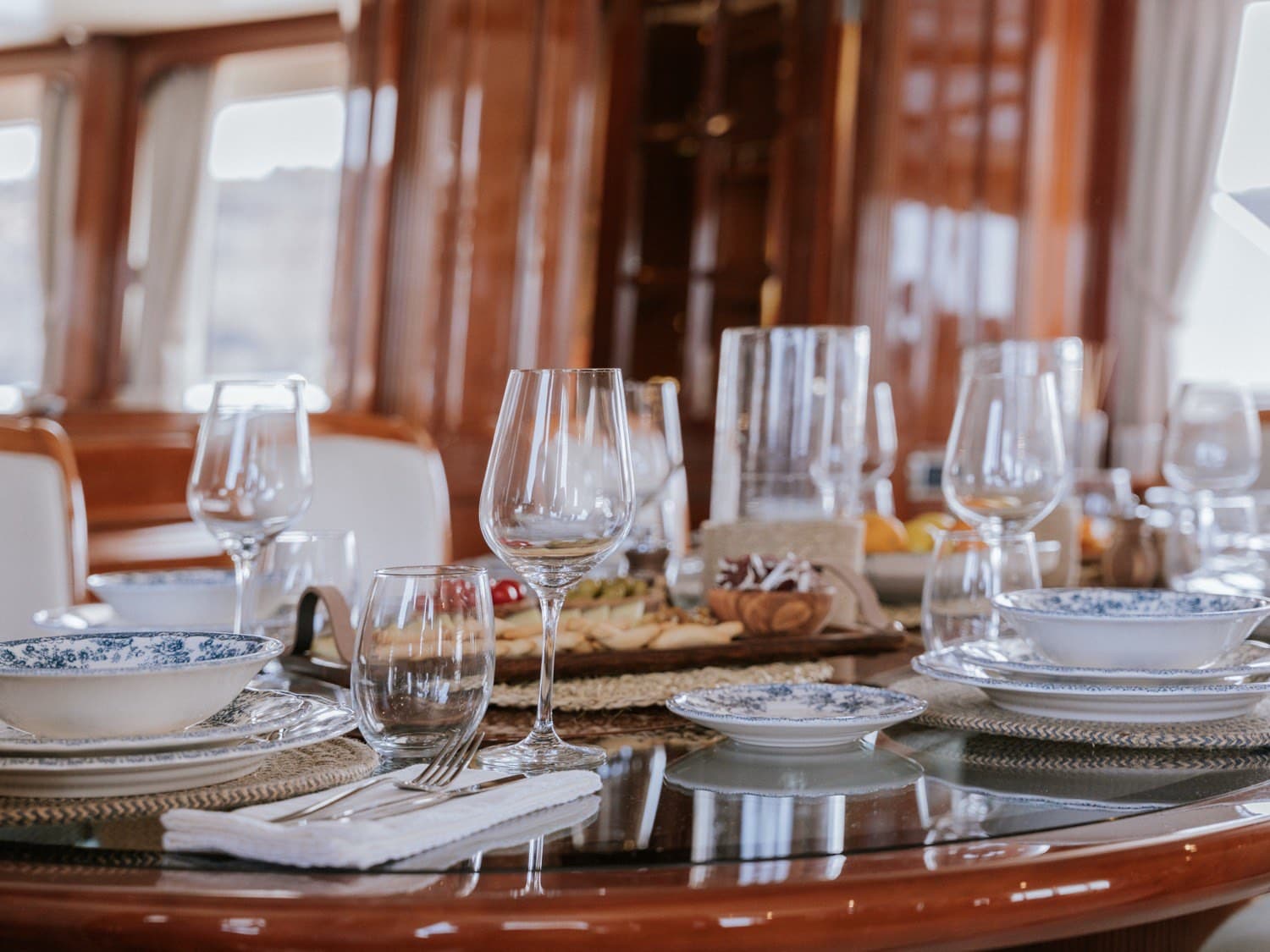 Refined yacht interior with elegant dining setup